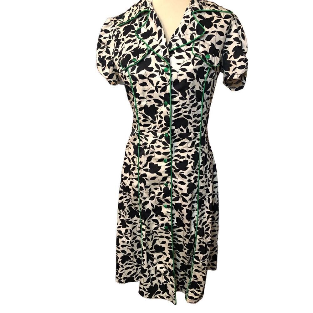 Marianne black and white floral button front with green satin buttoned and trim
